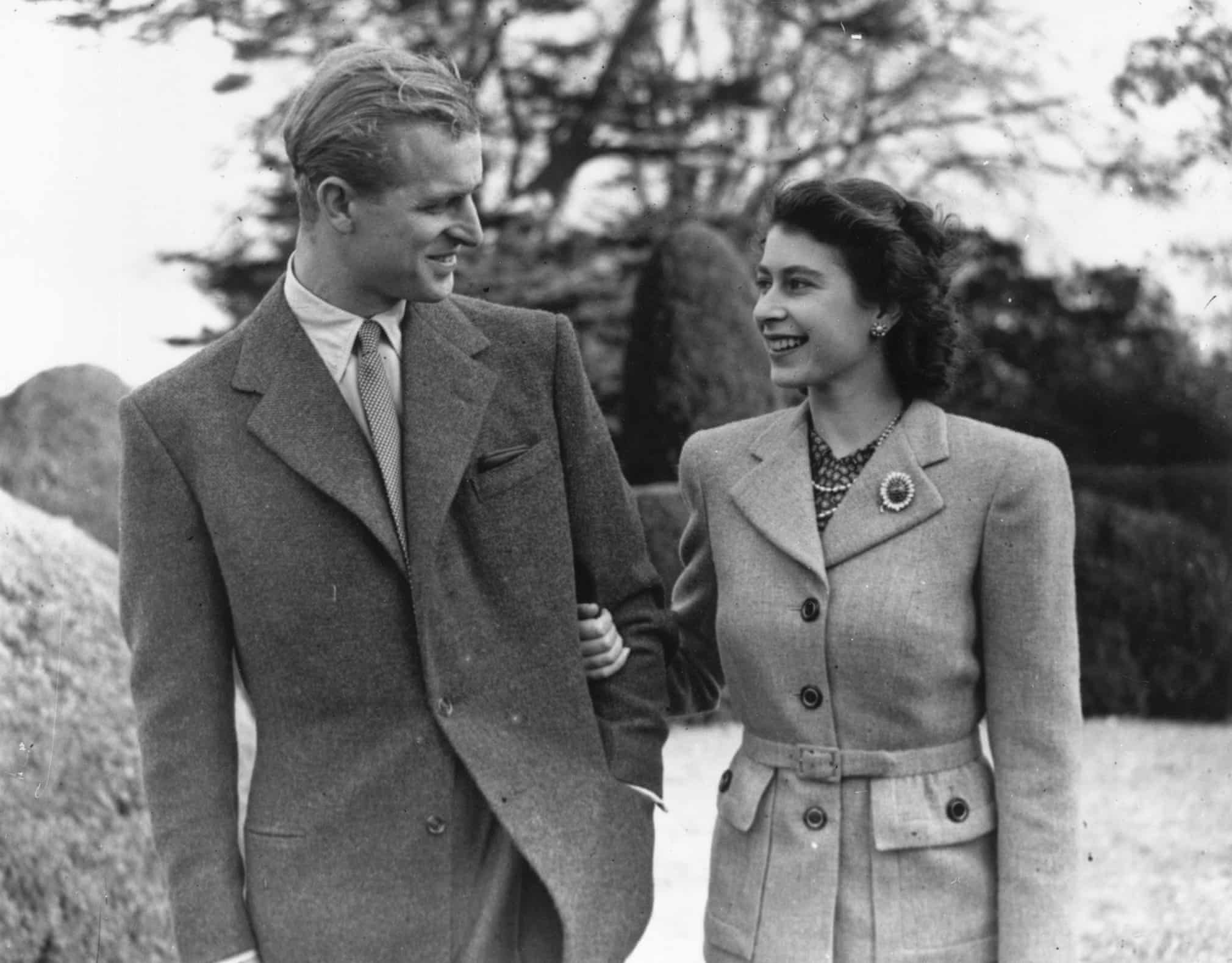 Philip and the Queen enjoy a walk during their honeymoon at Broadlands, Romsey, in Hampshire. Photograph: Topical Press Agency/Getty Images