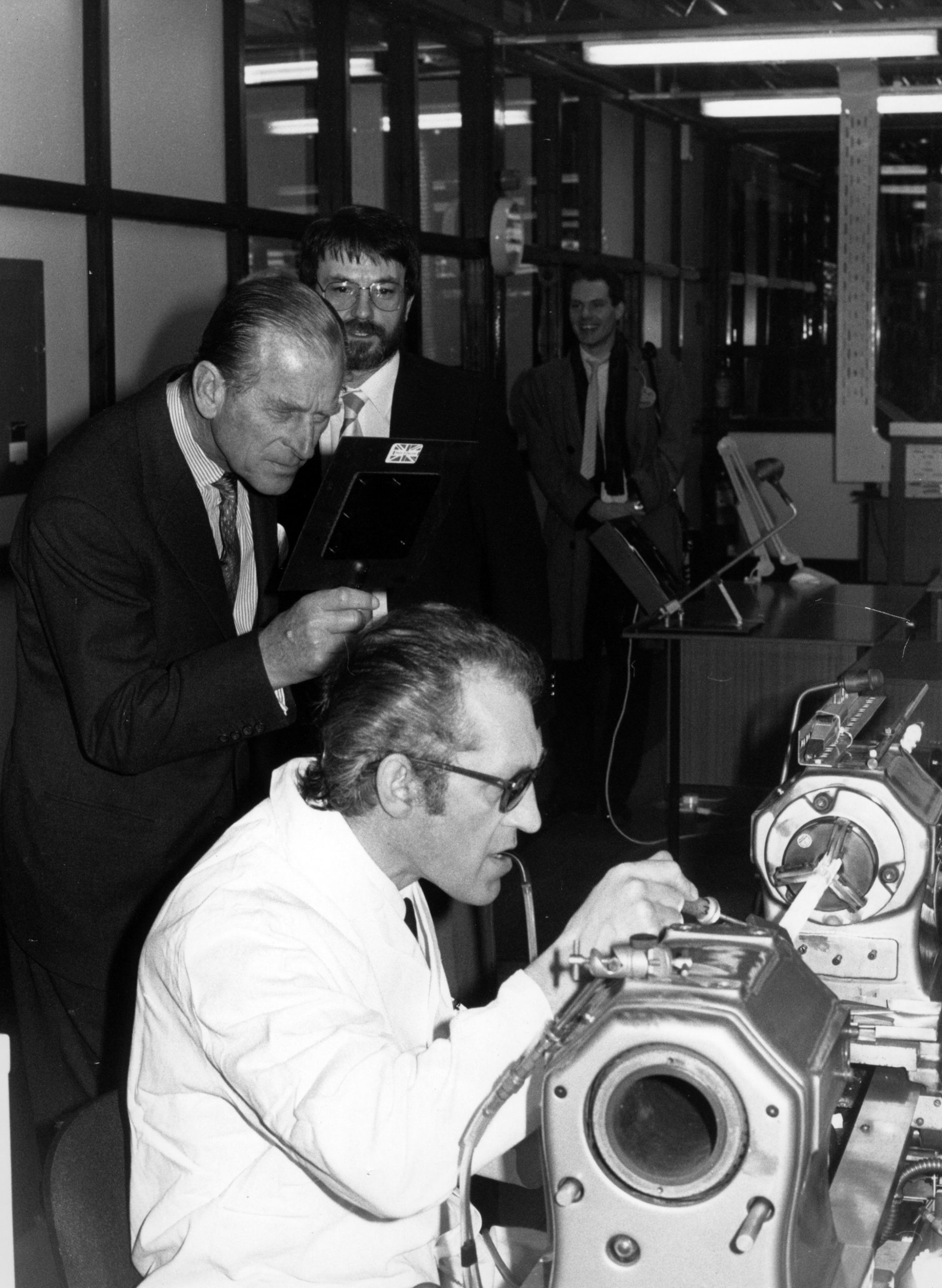 In 1985, witnessing the production of flash tubes during a visit to Cambridge Science Park in his role as Chancellor of Cambridge University.