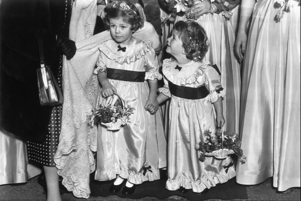 A 4-year-old Camilla (left) was a bridesmaid in a wedding at St. Marks Church in London in 1952.