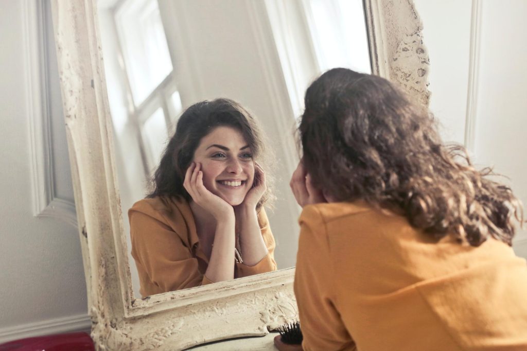 Smile, self and mirror