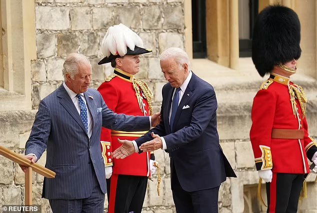 Mr Biden is welcomed into Windsor Castle by King Charles today