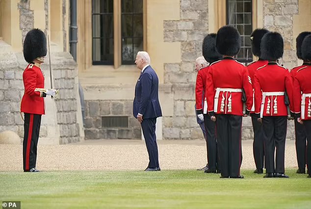 King Charles III and US President Joe Biden inspect the Guard of Honour from the Prince of Wales's Company of the Welsh Guards