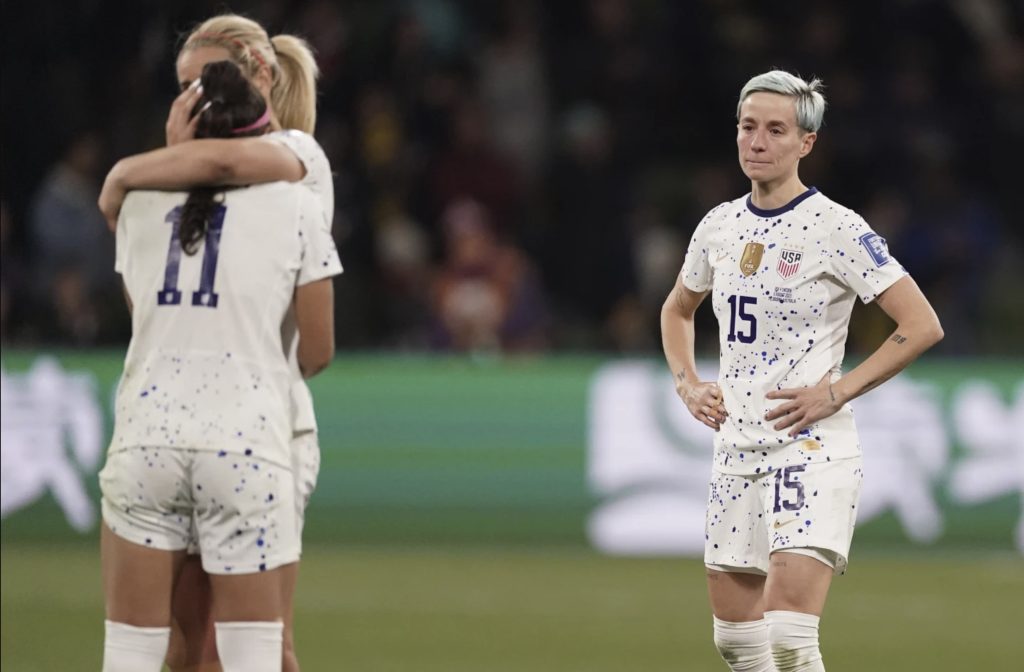 United States’ Megan Rapinoe, right, reacts with her teammates following their loss to Sweden in their Women’s World Cup round of 16 soccer match in Melbourne, Australia, Sunday, Aug. 6, 2023. (AP Photo/Scott Barbour)