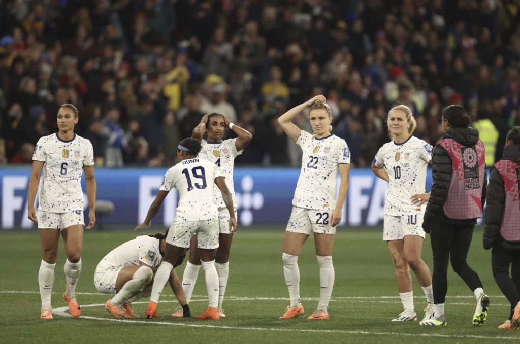 United States’ players react after losing their Women’s World Cup round of 16 soccer match against Sweden in a penalty shootout in Melbourne, Australia, Sunday, Aug. 6, 2023. (AP Photo/Hamish Blair)